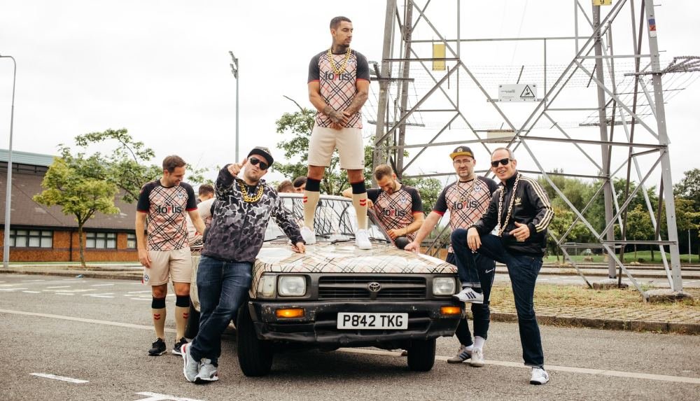 Newport County Hook Up With Goldie Lookin' Chain For Special 21/22 Third Shirt - featured image