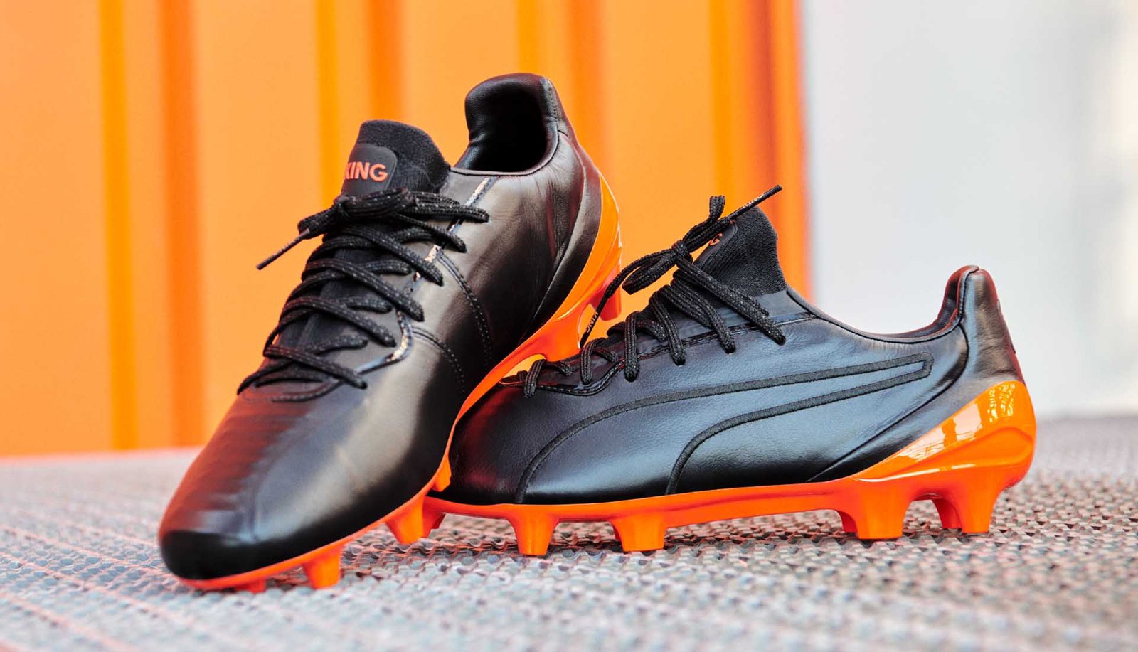 PUMA Unveil The King Platinum "Black/Shocking Orange" - featured image