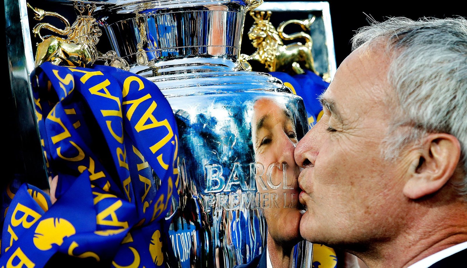 Ranieri Kissing Premier League Trophy Crowned Barclays 'Shot of the Century' - featured image