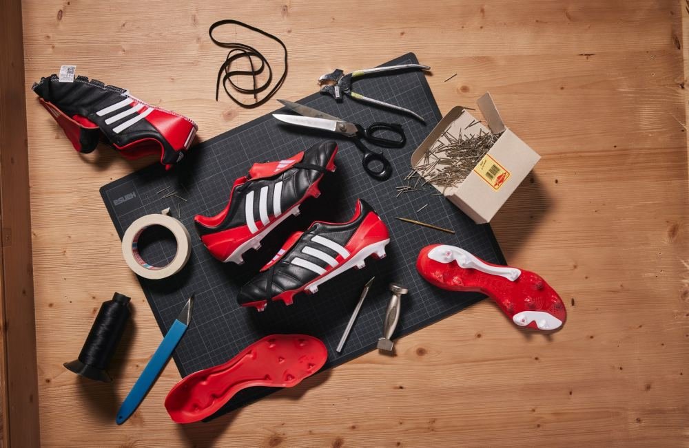 The ‘MIG’ adidas Predator Mania Lands In Classic “Black/White/Red” - featured image
