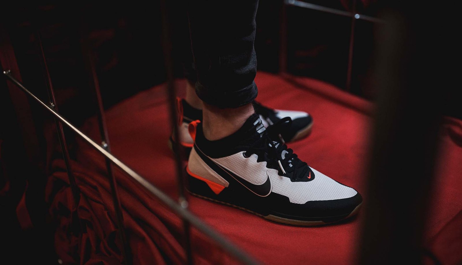 The Nike F.C. React Drops In "Desert Sand/Black/Bright Crimson" - featured image