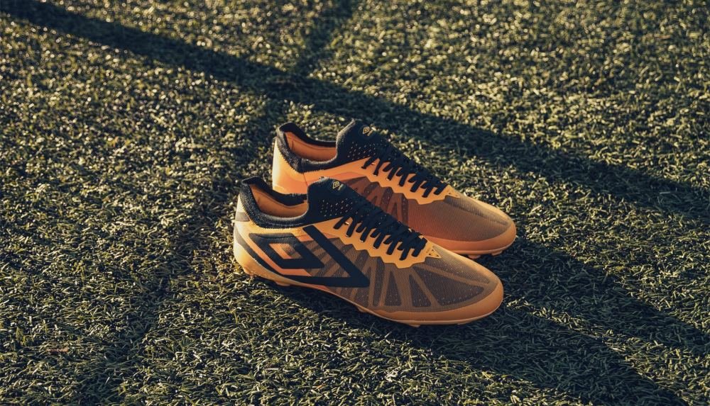 Umbro Wrap The Velocita In "Black/Saffron/White" Colourway - featured image